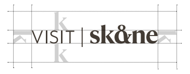 Visit Skånes logotyp med markeringar för frizon med bokstaven k.